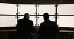 Business people, back and screen with mockup at night for online trading, monitoring or investing at office. Men, traders or brokers working late on computer display or space for stock market or app