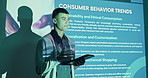 Speaker, projector or businessman in speech presentation for consumer behavior trends proposal to audience. Projection screen, sustainability solutions or leader with research feedback information