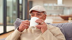 Coffee, relax and thinking with senior man in living room of retirement home for memory or nostalgia. Cup, drink or wellness and old person in apartment for break, rest or satisfaction with the past