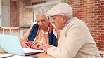 Paperwork, budget and senior couple with laptop, home and financial planning for retirement policy. Old man, woman and discussion in kitchen for mortgage payment, pension fund or health insurance