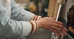 Cleaning, washing hands and woman in kitchen, hygiene and healthy habit with routine. Closeup, person and girl with water, liquid or aqua with wellness, remove bacteria and safety with splash or home