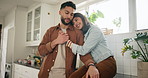 Happy, love and couple hug in kitchen for comfort, care and pride of new home together. Commitment, support and young man and woman embracing for mortgage ownership in house with trust in marriage