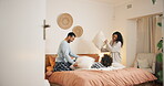 Family, funny and pillow fight in bedroom, games and child for freedom entertainment in home. Parents, son and relax together for bonding in relationship, happiness and weekend energy for love