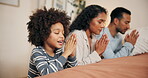 Family, child and hands for praying on bed together, worship and talking to God for praise or love. Parents, son and trust in jesus christ for peace or support, hope and gratitude for spirituality