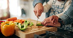 Hands, child and parent cutting vegetables for food, learning and cooking healthy lunch in home kitchen. Teaching, kid and chopping board with knife closeup for pepper, organic meal and girl help