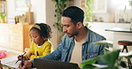 Laptop, homework and father with kid in house for remote work, education and child development. Computer, family and dad with freelance job sitting with girl student for activity with coloring book.