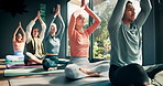 Yoga, group and meditation with namaste in studio for holistic wellness, mindfulness or spiritual healing on floor. People, diversity class or praying hands for mental health balance, peaceful or zen