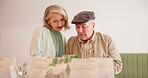 Elderly couple, food and shopping together in restaurant for lunch, decision and bonding with paper bag. Senior people, support and choice in cafe for brunch, breakfast or meal with opinion or option