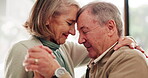 Senior couple, smile and dance with love in home for marriage, bonding and care in retirement. Elderly woman, man and holding hands with hug in house for commitment, connection or anniversary romance