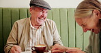 Happy, laugh and mature couple at coffee shop for bonding, conversation and relax together. Retirement, marriage and elderly man and woman in restaurant, cafe and diner for breakfast in morning