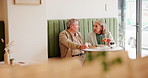 Breakfast, talking and senior couple at coffee shop for bonding, conversation and eating together. Retirement, marriage and elderly man and woman in restaurant, cafe and diner with food in morning