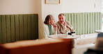 Happy, talking and senior couple at restaurant for bonding, conversation and relax together. Retirement, marriage and elderly man and woman in coffee shop, cafe or diner for breakfast in morning