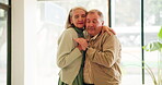 Senior couple, dance and holding hands in house for love, marriage and connection together with hug. Elderly people, embrace and celebrate anniversary, relationship and romance in home with bonding