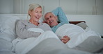 Relax, smile and senior couple in bed for romantic bonding, discussion and support in marriage. Care, old man and woman in bedroom for retirement morning, love and conversation for happy relationship