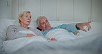 Mature couple, bed and watching with chat, morning and marriage with commitment. Talking, retirement care and health relationship in home with discussion in bedroom with happy people and love