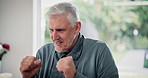 Success, happy and mature man on laptop in home for retirement bonus, payment and investment. Fist pump, finance and senior person on computer for loan application, winning and savings in living room