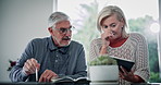 Stress, documents and mature couple on tablet in home for budget, financial review and mortgage payment. Retirement, digital tech and man and woman with bills for insurance, debt and online finance