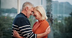 Love, forehead touch and senior couple in home for commitment, relationship and bonding in living room. Happy, marriage and mature man and woman embrace for romance, affection and intimate moment