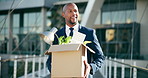 City, walking and business black man with box happy for interview success, opportunity and onboarding. Corporate, professional and person in urban town for recruitment, hiring and first day at office