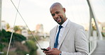 Phone, city and face of business black man for contact, typing email and networking. Professional, corporate and portrait of worker wink on smartphone for internet, website and social media in town