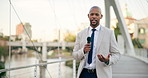 Man, news reporter and smile with microphone in street, face and urban infrastructure for expansion in city. African journalist, tv presenter and talking on bridge, buildings and development in Kenya