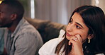 Loss, game and woman watching tv for sports, competition or match in home frustrated by results. Football fan, sad and disappointed girl on sofa for television and streaming for soccer tournament