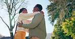 Love, couple and happy with dancing in nature for favorite song, radio playlist and bonding outdoor. Dancer, black people and moving with laughing on anniversary date, summer romance and lens flare