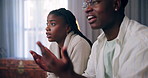 Black couple, sports and fans watching tv in home with fail, loss and argument conversation. Television, angry man and woman with game, streaming and disappointed at match together in living room