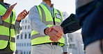 Handshake, partnership and construction team on site for building, renovation or maintenance for city planning. Contract, applause and industrial civil engineers shaking hands for project development