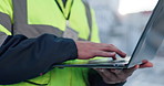 Architect, hands and typing with laptop on rooftop for construction, architecture or installation in city. Closeup, builder or civil engineer with computer for building design or maintenance in town