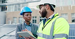 Construction worker, tablet and people with green engineer and teamwork on rooftop for installation. Renewable energy, engineering and urban development with tech, talk and system inspection in city