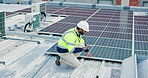 Engineering, man and tablet with solar panel on rooftop for renewable energy installation and quality assurance. Power supply service, technician and inspection of photovoltaic grid for maintenance