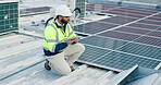 Engineer, man and tablet with solar panel on rooftop for renewable energy installation or quality assurance. Power supply service, technician or inspection of photovoltaic grid for safety maintenance