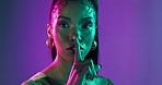 Woman, face and beauty with secret on neon background for glamour makeup, aesthetic gossip and drama news. Portrait, girl and privacy sign for cosmetic announcement, surprise emoji and lighting glow