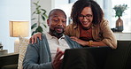 Couple, laptop and smile on sofa for banking, online shopping and travel planning in home. Man, happy woman and tech in living room for finance information, ecommerce or choosing policy for investing