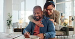 Mature, couple and documents in home with hug for bills profit, financial investment and loan application success. Interracial, people or paperwork at dining table with talking of insurance fund plan