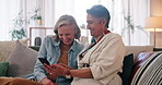 Smartphone, funny and mature lgbtq couple laugh together in home browsing social media or app. Gay, love and comedy with happy lesbian women looking at memes on cellphone for fun or romantic bonding