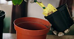 Gardening, spade and person with pot for soil, transfer and ready for new plant in home. Horticulturist, hobby and maintenance at table with fertilizer, agriculture or flower sustainability with care