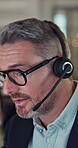 Sales agent, call center and talk with headset for customer service, advice or crm as professional. Mature person, businessman and helping with microphone as virtual assistant or in technical support