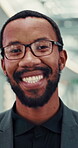 African man, face or walking in office with glasses, happiness or excited for career development. Portrait, smile or person in lobby for corporate growth, professional or employment in Nigeria