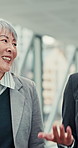 Business, women and meeting in lobby for discussion, introduction and welcome to company. Walking, talking or people in office building for walkthrough, industry FAQ and smile for funding opportunity