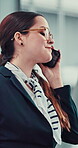 Business, woman and talking with phone call in lobby for project management, communication or deal negotiation. Professional, employee or smartphone for contact, mobile chat or networking in building