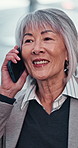 Phone call, communication and Asian woman on escalator in office for legislation contract. Contact, business and mature state attorney on mobile discussion for legal civil rights government case.