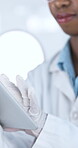Science, hand and person with tablet for results, brainstorming and findings report. Closeup, scientist or typing on tech for investigation, experiment review or research in laboratory for study