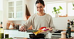 Woman, wood board and cooking with vegetables in kitchen for meal prep, health lunch and nutrition in morning. Chef, knife and pan for organic food process, salad ingredient and vegan brunch at house