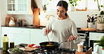 Woman, cooking and stir food in kitchen for meal prep, healthy lunch and nutrition of morning breakfast. Smile, female person and vegetables aroma with process, salad ingredients and vegan at house