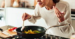 Woman, hands and cooking in kitchen with aroma, vegetables and stirring food in pan. Nutritionist, culinary skills and smelling dish in home for recipe, nutrition and stir fry meal prep for wellness