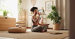 Woman, exercise and drinking water on floor in home for liquid, nutrition or hydration in workout. Weekend, fitness and female person with bottle on carpet for natural detox, minerals or healthy body