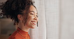 Woman, face and smile by window in home for reflection, peace and start morning with inspiration. Person, girl and happy by curtains for portrait, perspective and insight with thinking in Colombia