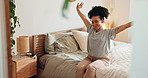 Home, happy and woman on bed stretching for relaxing, resting and comfortable in bedroom in morning. Apartment, wake up and person with smile ready to start day for health, wellness and calm in house